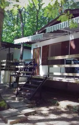 a house with a staircase leading up to it at Bungalows Dani in Kamchia