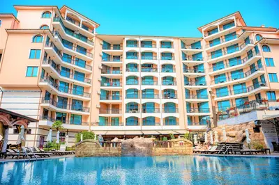 a hotel with a pool in front of it at Menada Apartments in Karolina in Sunny Beach