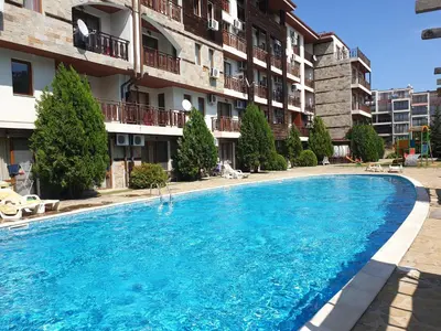 a large swimming pool in front of a building at MitProt Panorama Bay 2 luks apartment 102 in Sveti Vlas