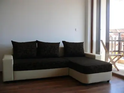 a bed sitting in a room next to a window at Complex Kentavar - Free Fast WiFi in Sveti Vlas