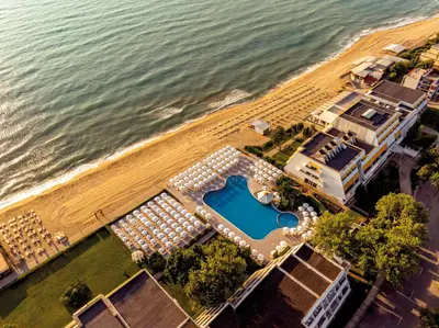 an overhead view of the beach and a resort at AluaSun Helios Beach - All Inclusive in Obzor