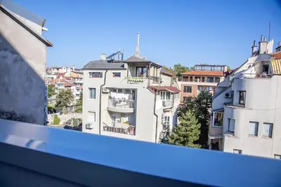 a view of a city from the balcony of a building at Colorful 1-BDR Apartment - Top center of Burgas by Flаt Manаger in Burgas City