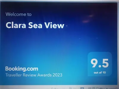 a cell phone screen with a welcome to cala sea view at Clara Sea View in Burgas City