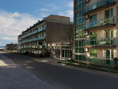 an empty street in front of a building at Clara Sea View in Burgas City