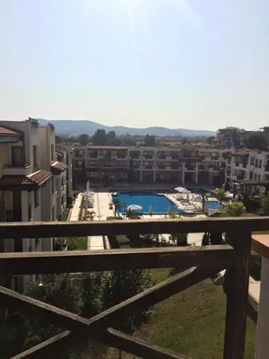 a view from the balcony of a building with a pool at Apartment on the sea at St Nikolas Complex-Ira in Chernomorets
