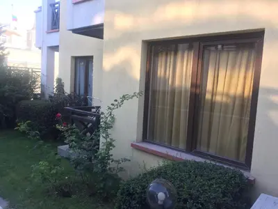 a window on the side of a building at Apartment on the sea at St Nikolas Complex-Irina in Chernomorets