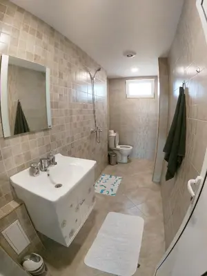 a bathroom with a sink and a toilet at By the CATHEDRAL · TOP center · 2 Bedroom FLAT in Varna City