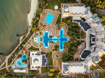 an overhead view of a resort with a blue cross at Dreams Sunny Beach Resort and Spa - Premium All Inclusive in Sunny Beach