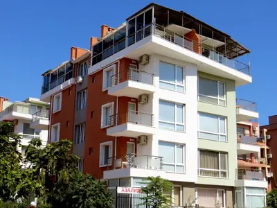 an apartment building with balconies on top of it at Apartments in Azalia 2 Complex in Nesebar