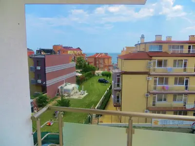 a view of a city from a balcony at Apartments in Azalia 2 Complex in Nesebar