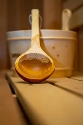 a wooden spoon sitting on top of a counter at Sunny Paradise ll in Kiten