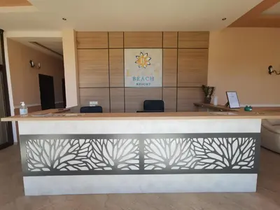 a bar in a dental office with a reception counter at Lily Beach Resort in Sozopol
