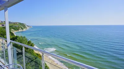 a view of the ocean from a balcony at Плажни Апартаменти Силвър Бийч - Silver Beach Sea Apartments in Byala