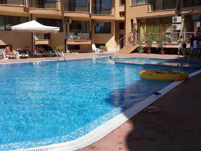 a large swimming pool in front of a building at AMADEUS 5 in Sunny Beach