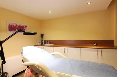a hospital room with a bed and a lamp at Generaator House in Aheloy