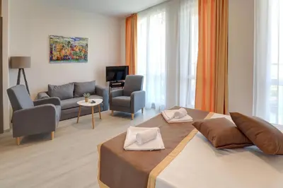a living room with a bed and a couch at Eco complex Zdravets near Varna in Zdravets