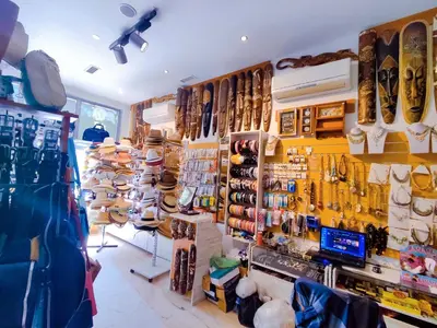 a store filled with lots of different types of shoes at Moonlight Hotel - All Inclusive in Sveti Vlas