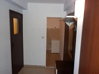 a room with a hallway with a door and a bathroom at Ivanova Cheshma Guest House in Varna City