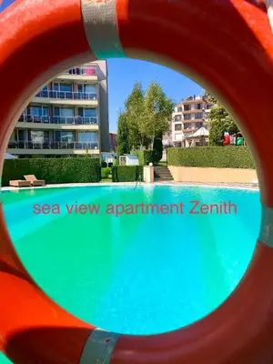 a view of a swimming pool with a red object at Sea View NewApartment-Bulgaria-Chernomorets in Chernomorets