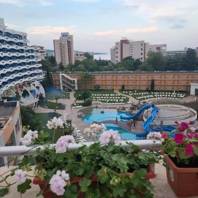 a view from the balcony of a resort with a water park at Apartment in Trakia Plaza complex in Sunny Beach