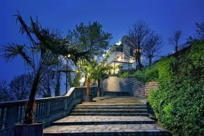 a house on top of a hill with stairs at Comfy home in the heart of Burgas in Burgas City