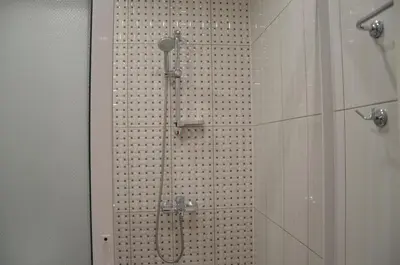 a shower in a bathroom with a glass wall at Sania in Obzor
