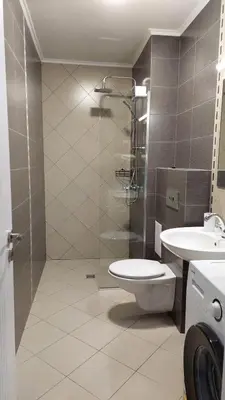 a bathroom with a toilet and a sink at Anthic 7 Apartment 3 in Sozopol