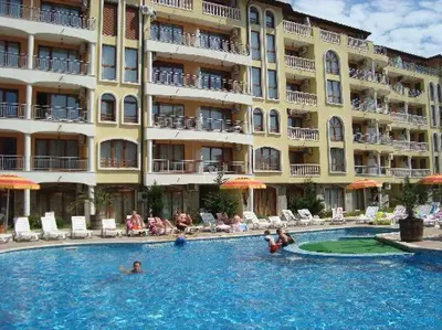 a large swimming pool in front of a hotel at Hotel Royal Dreams Privat Apartment in Sunny Beach