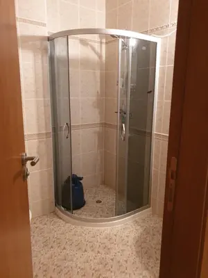 a shower with a glass door in a bathroom at Hotel Royal Dreams Privat Apartment in Sunny Beach