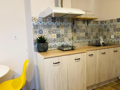 a kitchen with a sink and a counter top at Colors Boutique in Obzor