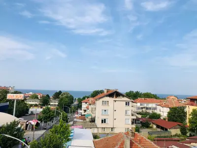 a view of a city with buildings and a blue sky at Colors Boutique in Obzor