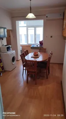 a kitchen and dining room with a table and chairs at UNIQUE LOCATION APARTMENT WITH PARKING in Burgas City