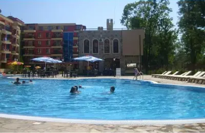 a group of people swimming in a large swimming pool at Kalia Apartment Sunny Beach 2-Zimmer+Balkon TOP in Sunny Beach