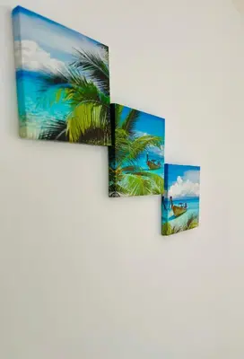 four panels of palm trees on the beach at Summer Apart Janet in Obzor