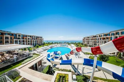a view of a water park with a roller coaster at Premier Fort Beach Luxury in Sveti Vlas