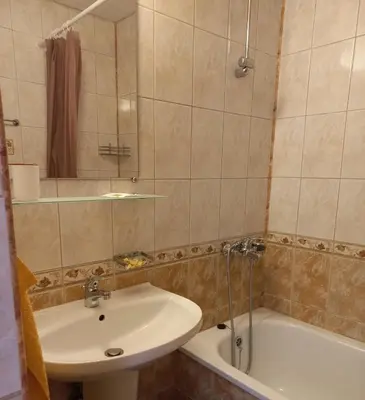 a bathroom with a sink and a toilet and a tub at Vega Village Ap A8 in Sveti Vlas