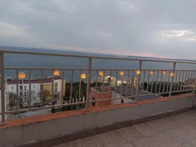 a view of the ocean from a balcony at Grand Resort - Sea Viev and Premium Apartments in Sveti Vlas