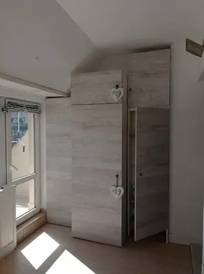a room with a door with two hearts on it at Studio San Stefano in Burgas City