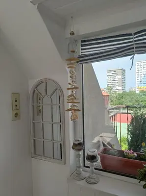 a window with a white door at Studio San Stefano in Burgas City