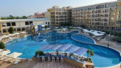 an overhead view of a large swimming pool in a hotel at Студио Релакс, Ахелой in Aheloy
