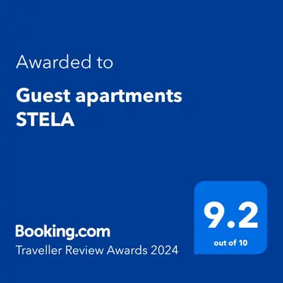 a screenshot of a cell phone with the text awarded to guest appointments stella at Guest apartments STELA in Tsarevo