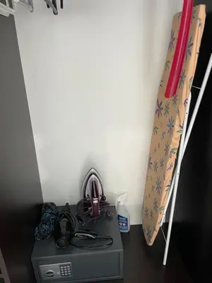 a room with a desk with a bed and a desk at Day Dream in Burgas City
