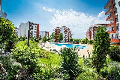 an apartment with a swimming pool and some buildings at PANORAMA MARINA FORT BEACH & GRAND RESORT - Premium Apartments Sea Viev in Sveti Vlas