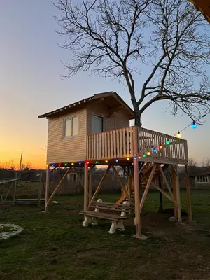 a tree house on a wooden play structure at Caravans 10 min to Tsonevo Lake & 35 min to Black Sea in Tsonevo