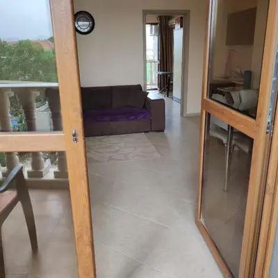 a mirror in a living room with a couch at Kalia, Zweizimmer, Zweibalkon, Top-Apartment in Sunny Beach