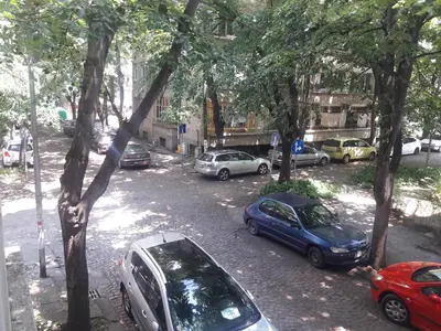 a group of cars parked in a parking lot at Eli Apartment Burgas Center in Burgas City