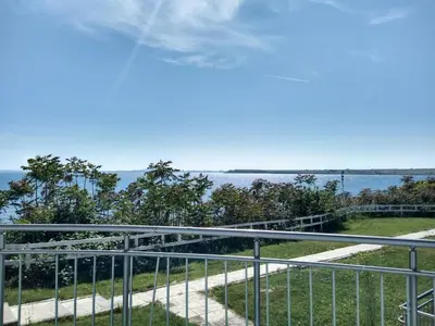 a view of the ocean from a balcony at The Blue Studio - In a complex next to the beach by Flаt Manаger in Pomorie