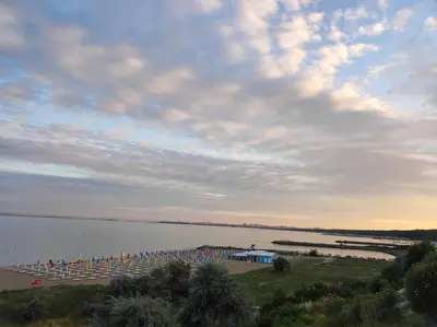 a large body of water with a large group of boats at Прекрасен апартамент с изглед към морето Сарафово 1 in Burgas City