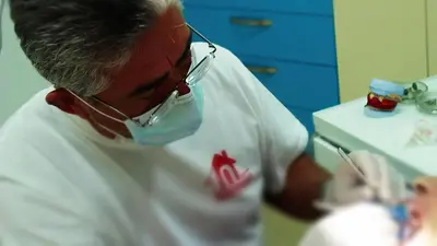 a man with a mask on his face in a room at Villa Denta in Nesebar
