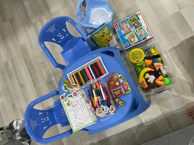 a blue toy bag with school items in it at sea ​​view apartment Sozopol in Sozopol